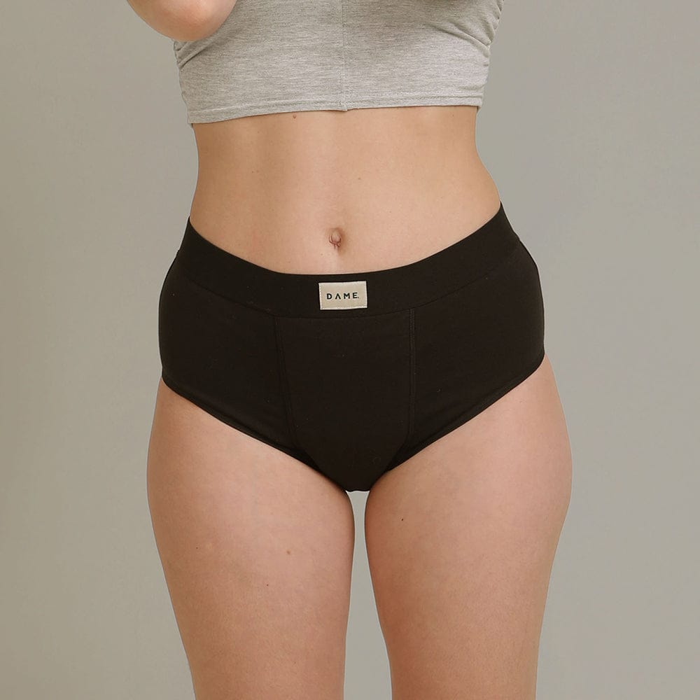 DAME Period Pant - High Waist Comfort in black, designed for heavy flow with absorbent organic cotton. Leak-proof fit for all-day freshness.