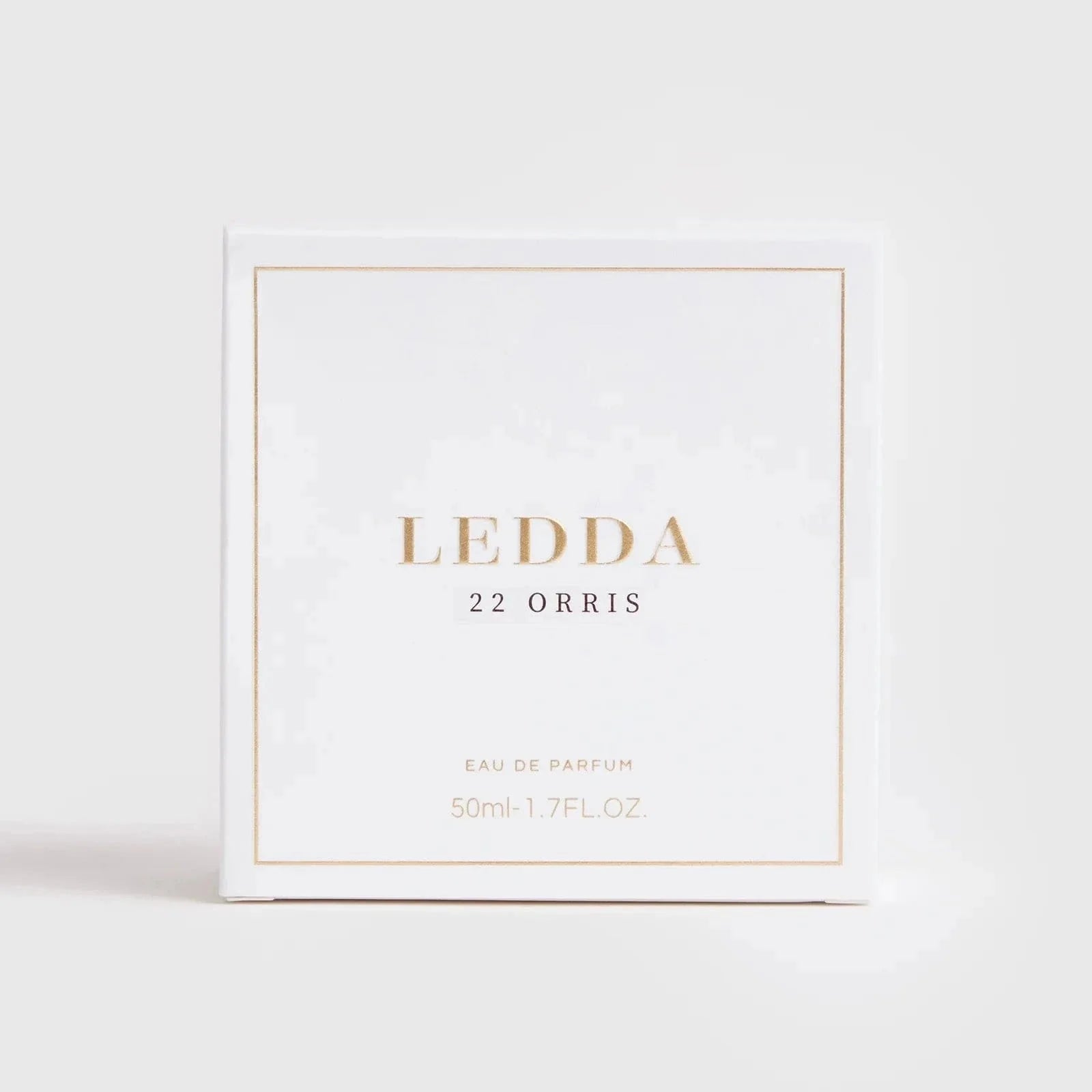 22 Orris Eau De Parfum 50ML by LEDDA with soft floral scent, featuring iris butter, jasmine, and musk in a clear ribbed glass bottle with gold cap.