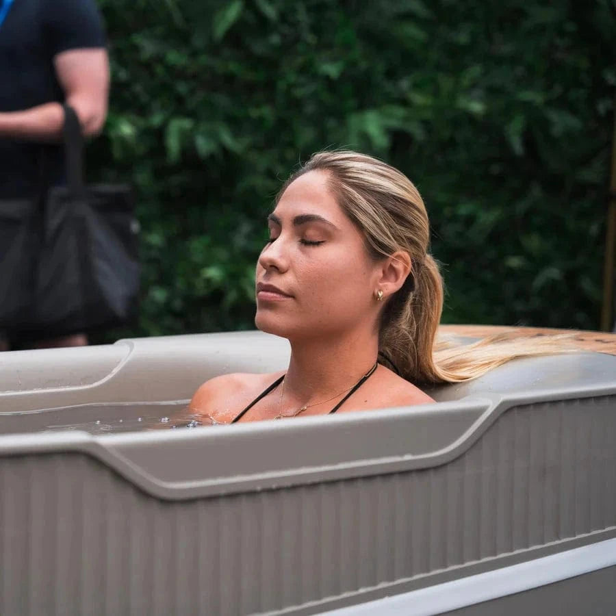 Monk Smart Ice Bath - Smart Ice Bath System | Cold Therapy Tech in modern home gym setting with athlete preparing for cold therapy session.