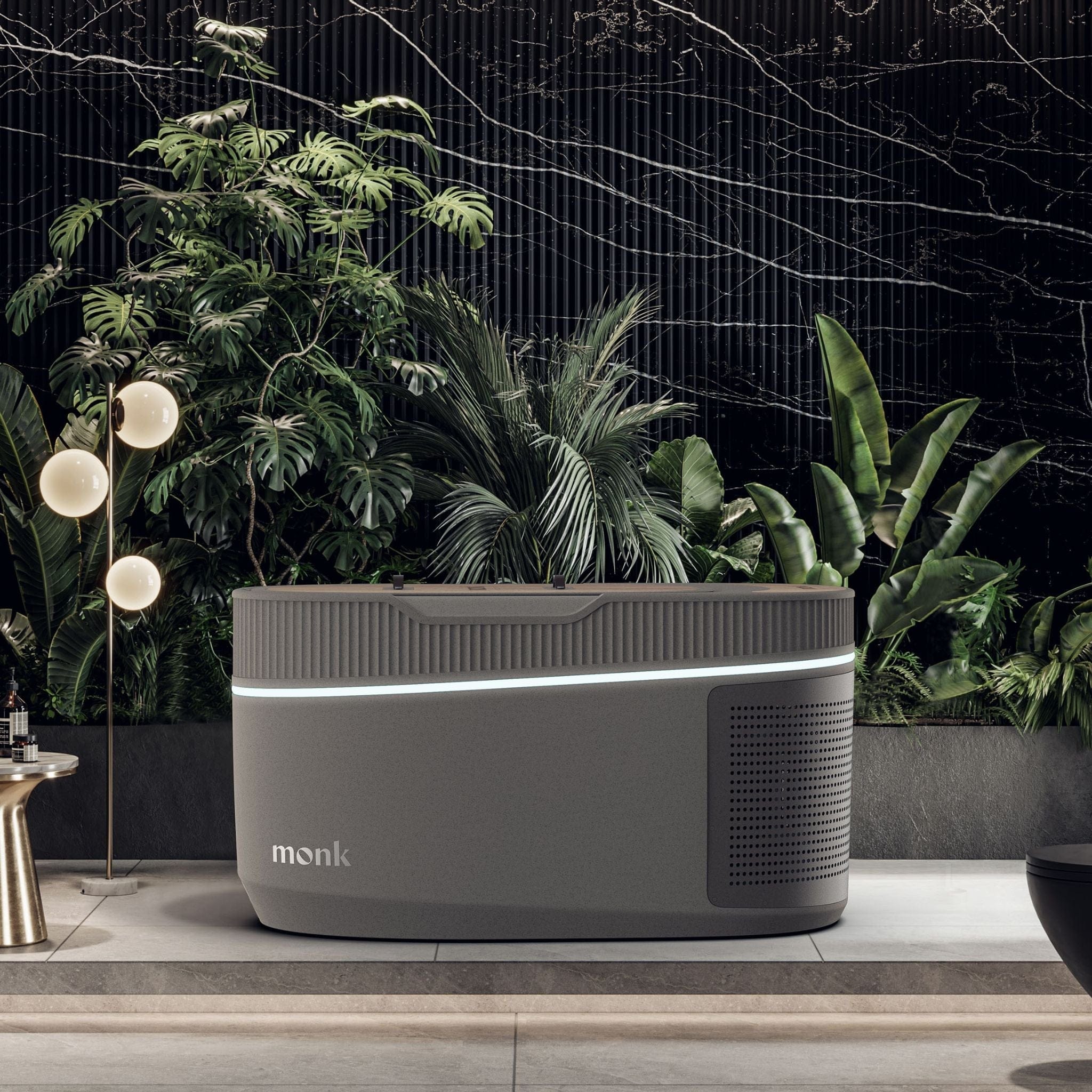 Monk Smart Ice Bath for optimal cold therapy with sleek gray design, self-cleaning system, and app connectivity, set in a luxury indoor spa space.