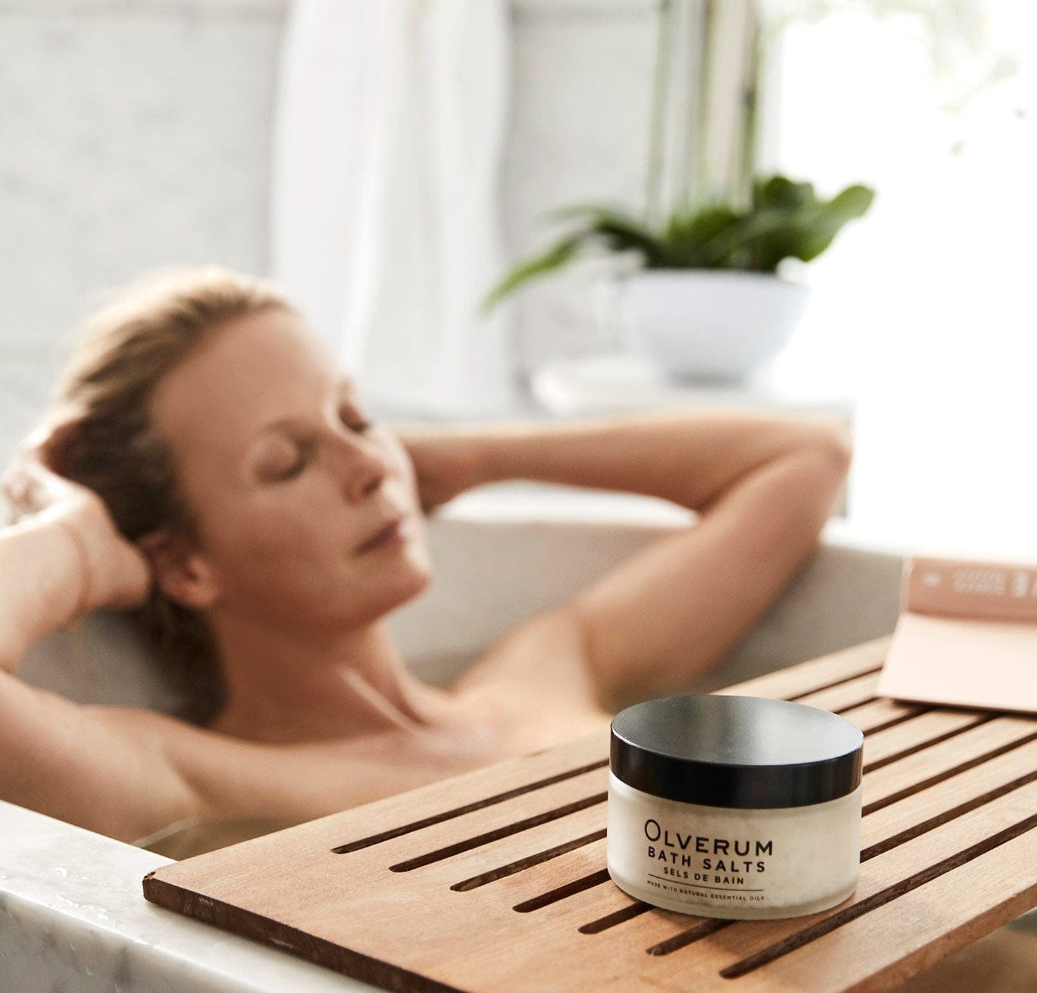 Restorative Bath Salts - 200g, a silken mineral soak with Dead Sea salts and avocado oil, supports skin repair and relaxation for a pure bath experience.