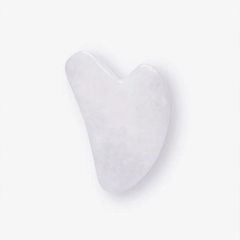 The Gua Sha Tool - Jade Gua Sha Tool | Sculpt & Rejuvenate, a smooth white jade facial massage tool for lifting and toning skin naturally. Ideal for enhancing lymphatic drainage and reducing wrinkles in skincare routines.