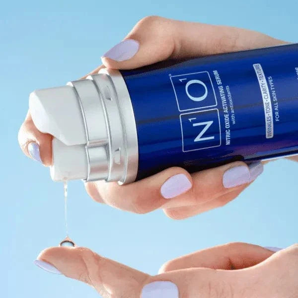 Age-Defiance Serum - Rejuvenate Skin | Reduce Wrinkles with Nitric Oxide and Vitamin C in a 30ml blue bottle for all skin types.