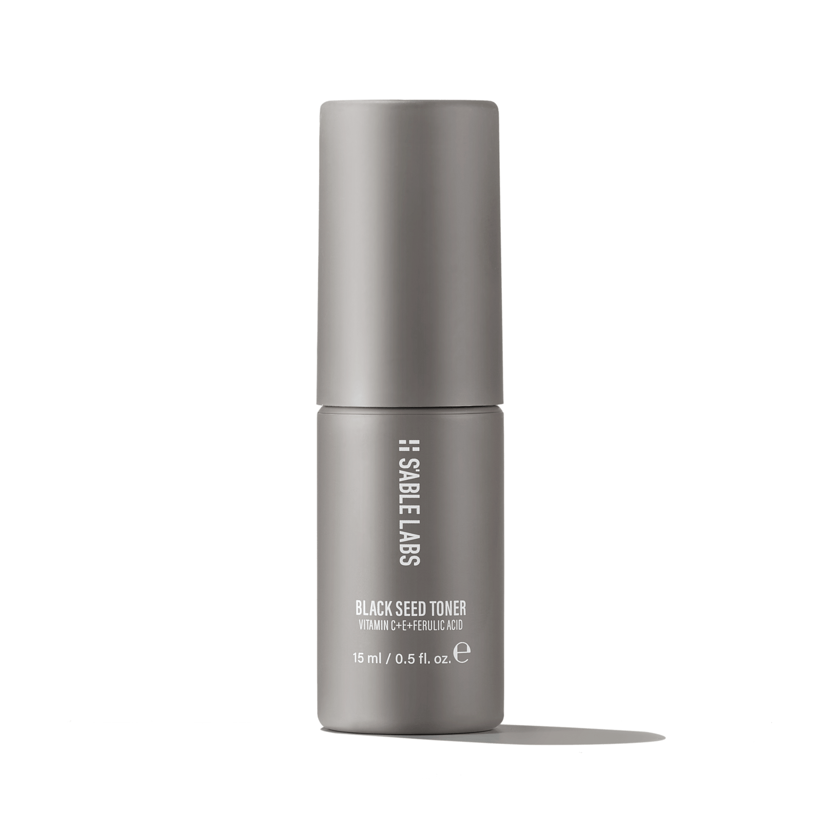 Black Seed Toner Mini - Antioxidant Formula with AHAs, Vitamin C & E in a sleek 15ml grey bottle by S’Able Labs, ideal for brightening and balancing skin.