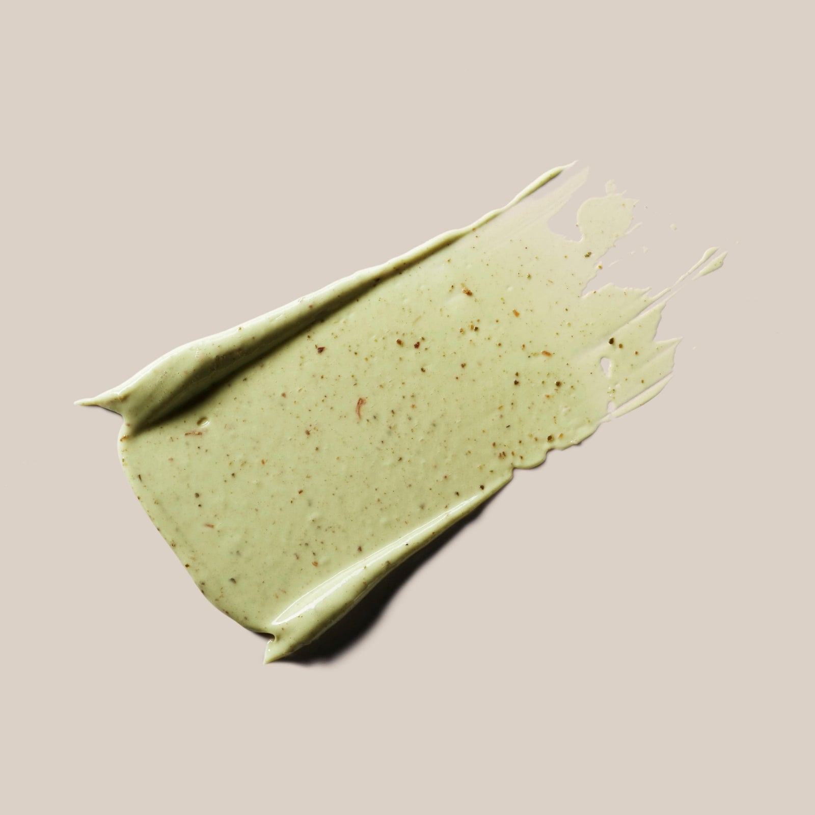 Qasil Exfoliating Mask - Brightening Face Exfoliant | AHAs, PHAs in sleek grey tube held by hand. Natural detoxifying skincare for glowing complexion.