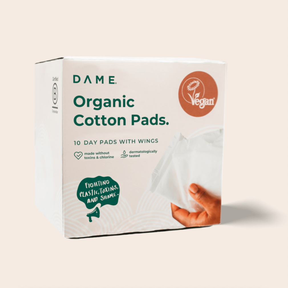 DAME Organic Cotton Pads box featuring eco-friendly period pads with wings. Biodegradable, vegan, and toxin-free for sustainable menstrual care.