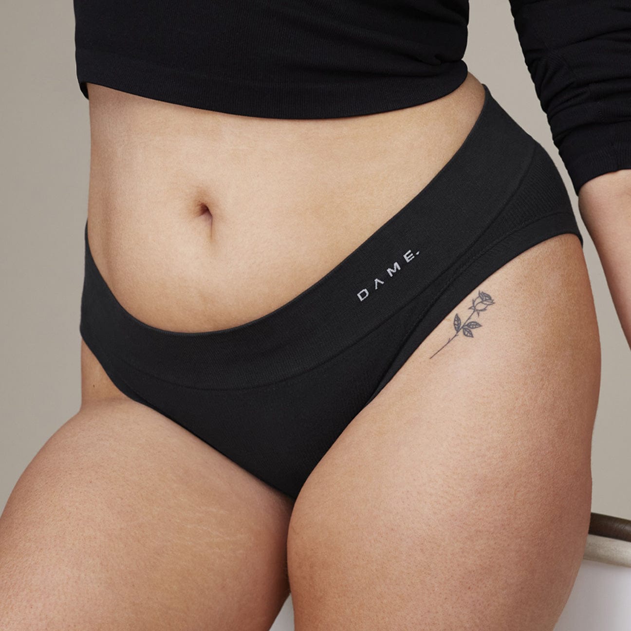 Seamless Period Pants by DAME in black featuring DAMEdry Tech, offering breathable, leak-proof, and eco-friendly menstrual protection for women.