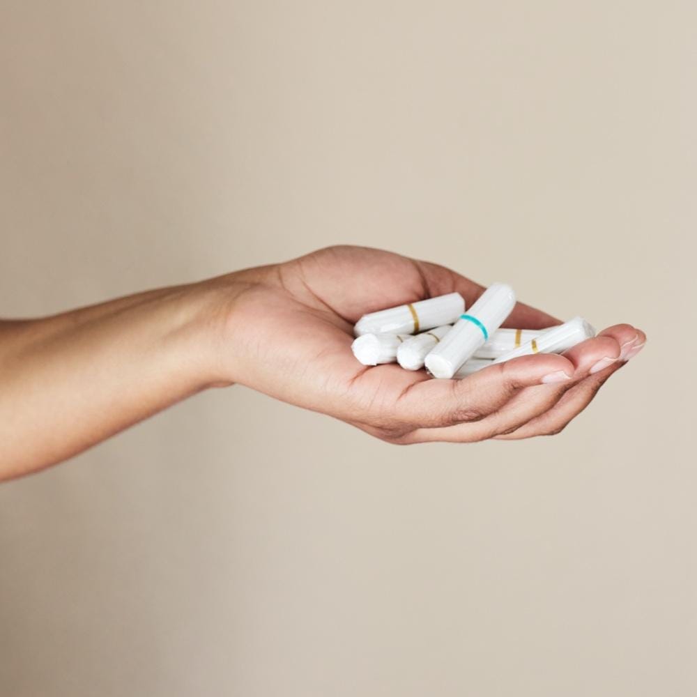 DAME Organic Tampons Value Pack with 64 regular cotton tampons, featuring plastic-free, toxin-free, and vegan-certified packaging design.