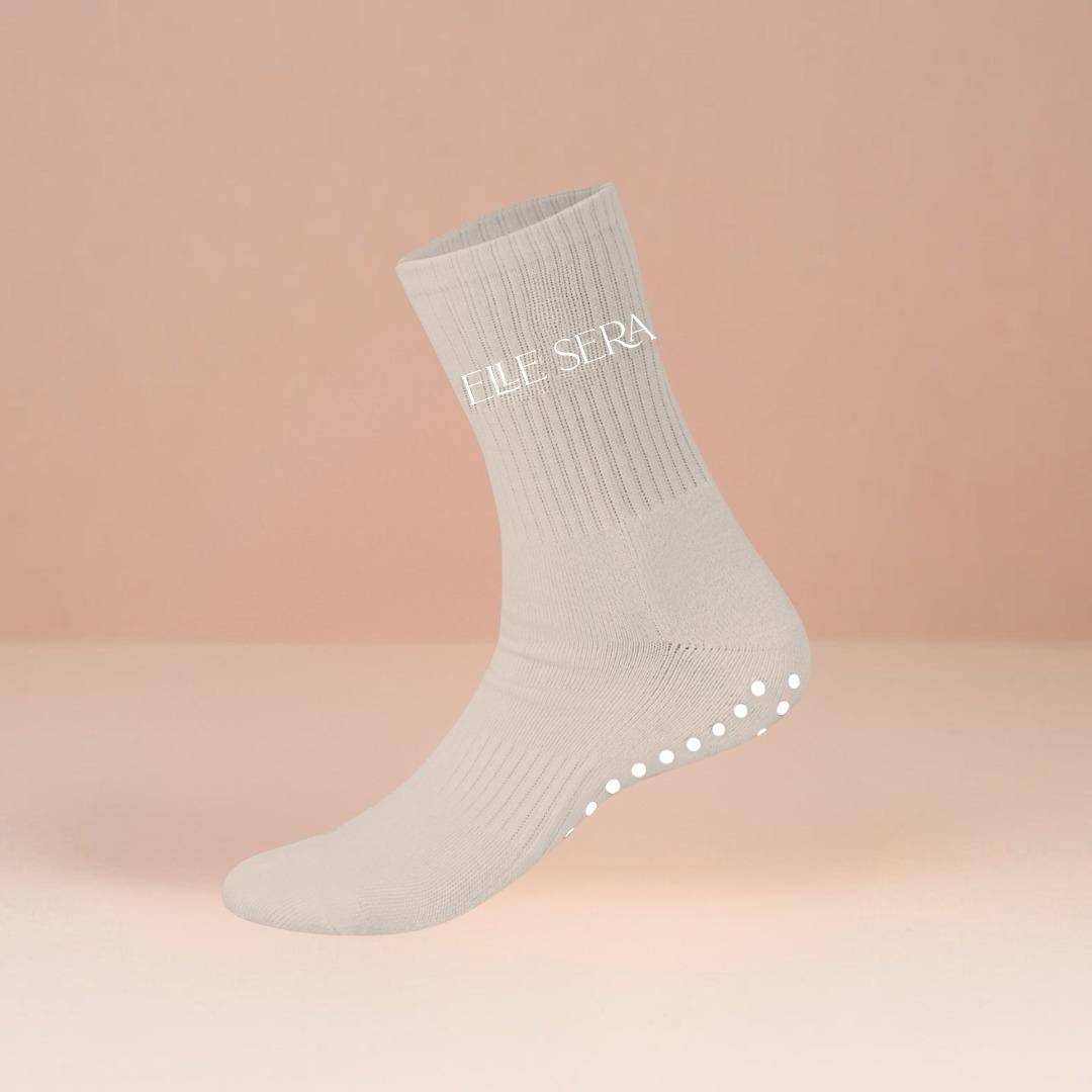 Elle Sera Pilates Socks in white with non-slip grip soles for enhanced stability. Ideal for yoga, barre, or reformer workouts with secure fit.