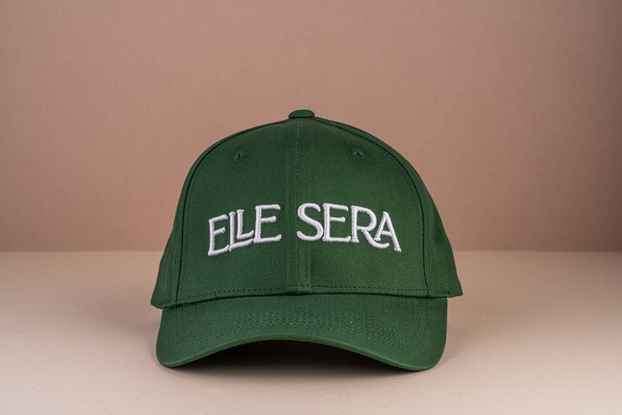 Elle Sera Cap in navy blue with bold white 3D logo embroidery, showcasing a snug fit and durable design. Stylish baseball cap for daily wear.