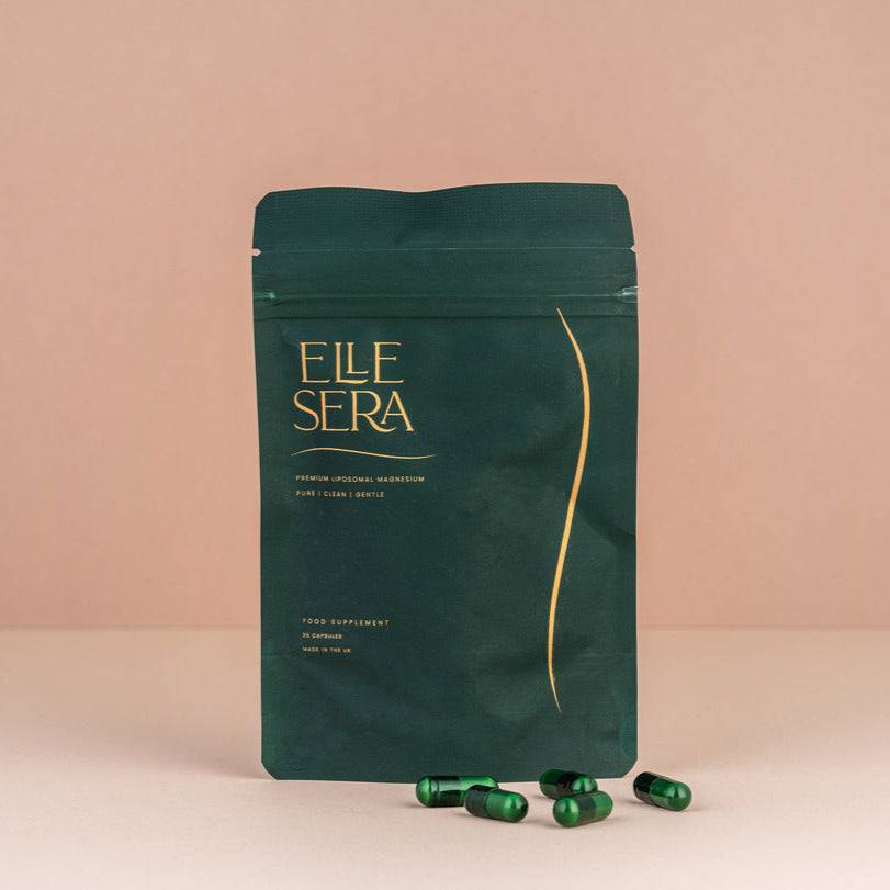 Elle Sera Magnesium Liposomal Bisglycinate Supplement in dark green resealable pouch with green capsules, ideal for stress relief and muscle support.