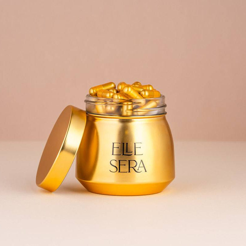 Golden Decanter by Elle Sera with a sleek, rounded design and luxury finish. Ideal for elegant wine serving in upscale barware collections.