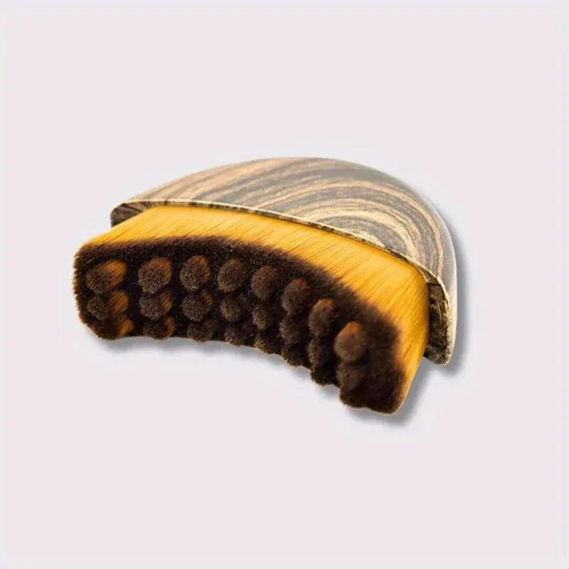 Close-up of Facial Sculpting Brush for Precision featuring dense bristles and ergonomic wood-textured grip for manual facial massage.