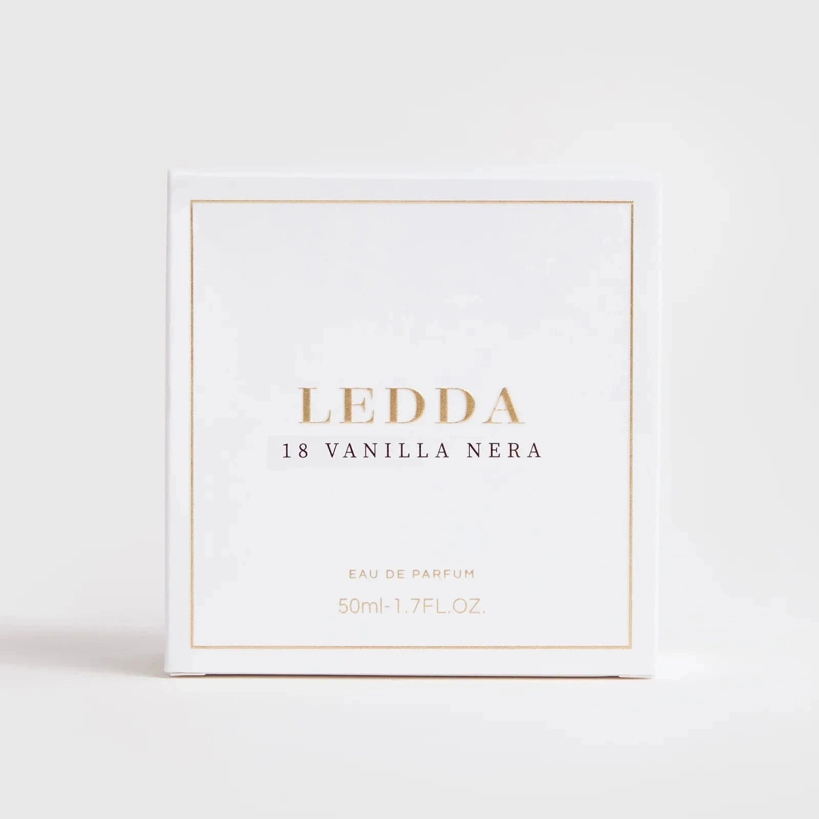 18 Vanilla Nera Eau De Parfum - 50 ML by LEDDA in a clear ribbed glass bottle with gold cap, offering a sweet smoky fragrance blend.