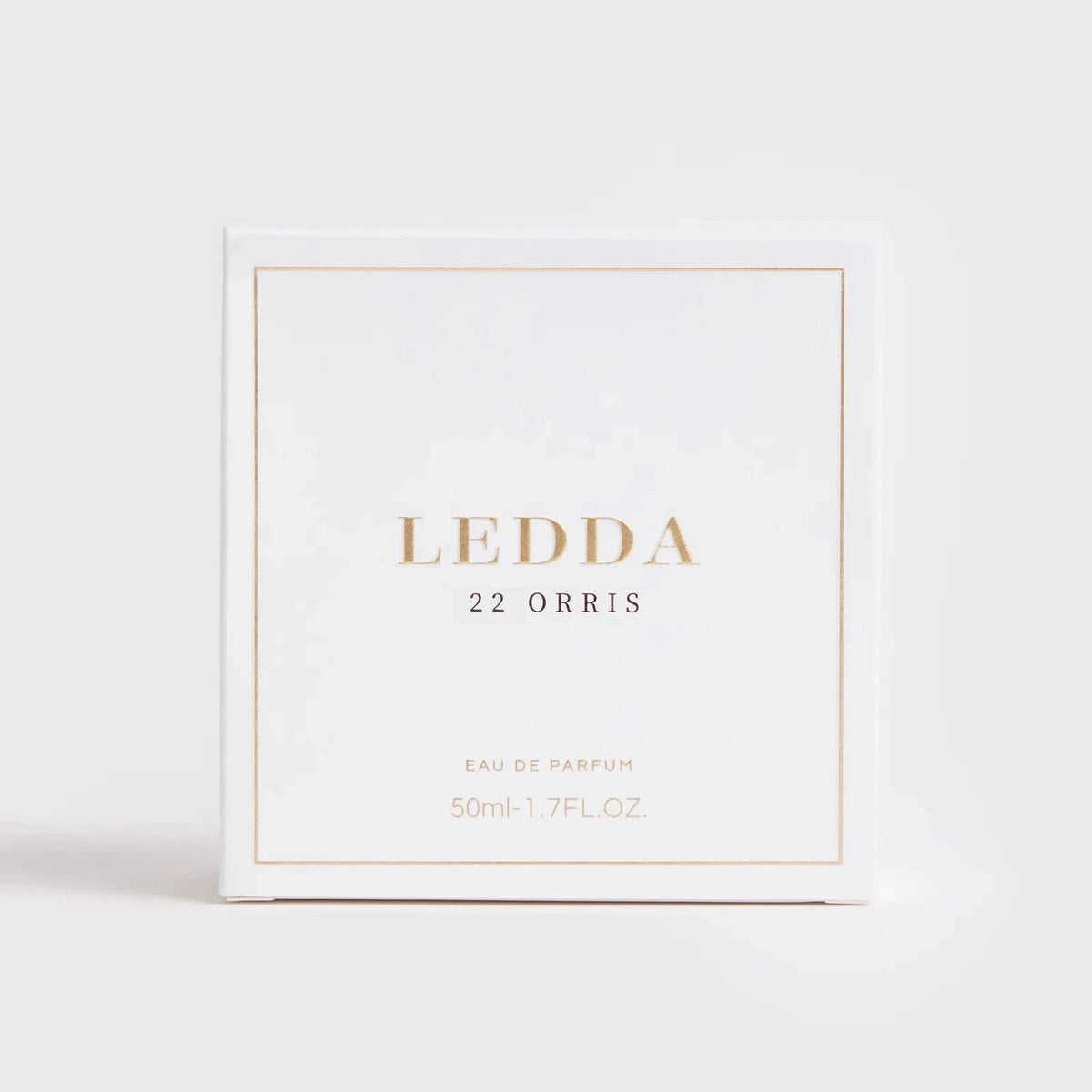 22 Orris Eau De Parfum 50ML by LEDDA with soft floral scent, featuring iris butter, jasmine, and musk in a clear ribbed glass bottle with gold cap.