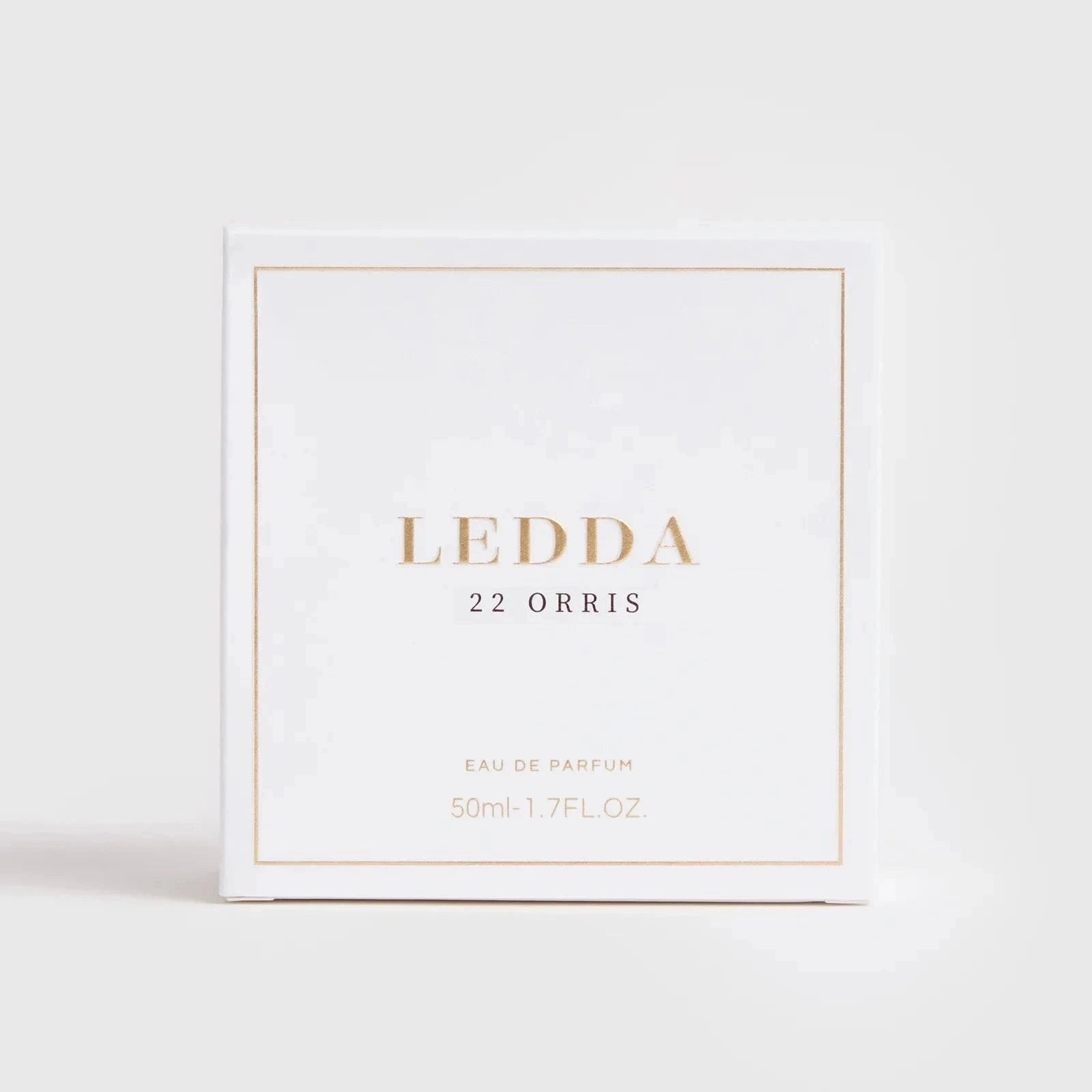 22 Orris Eau De Parfum 50ML by LEDDA with soft floral scent, featuring iris butter, jasmine, and musk in a clear ribbed glass bottle with gold cap.