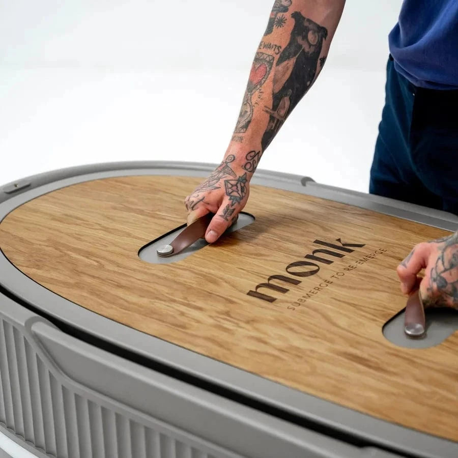 Monk Smart Ice Bath - Smart Ice Bath System | Cold Therapy Tech in modern home gym setting with athlete preparing for cold therapy session.