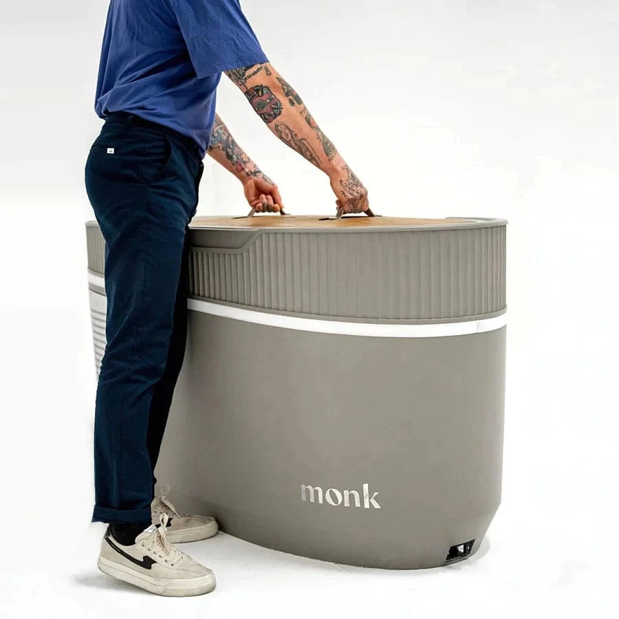 Monk Smart Ice Bath - Smart Ice Bath System | Cold Therapy Tech in modern home gym setting with athlete preparing for cold therapy session.