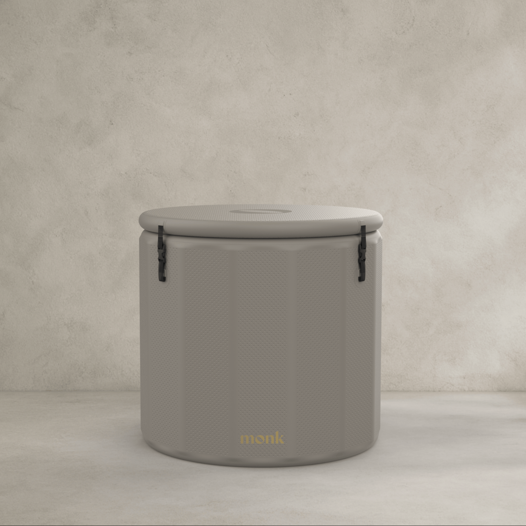 Monk Nomad inflatable bathtub in beige with portable design, ideal for baby bathing and cold therapy recovery. Features secure lid and compact build.