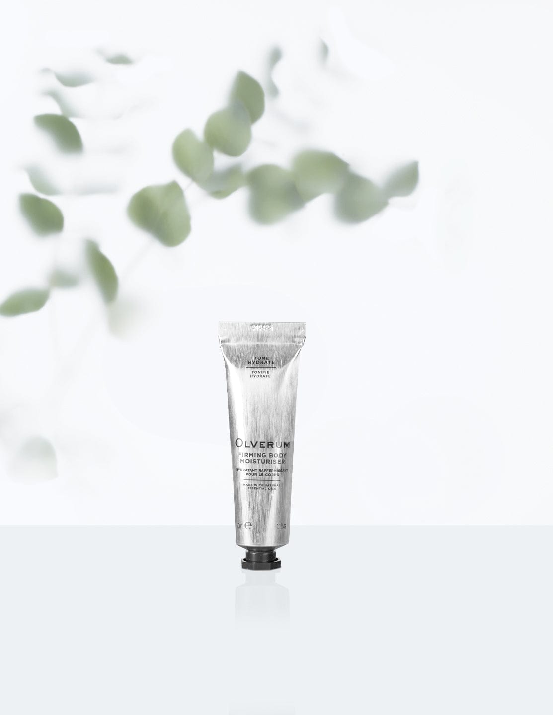 Discover Olverum Firming Body Moisturizer, a 30ml cream enhancing skin firmness with meadowfoam, rice extracts, and papaya enzyme for smoother skin.