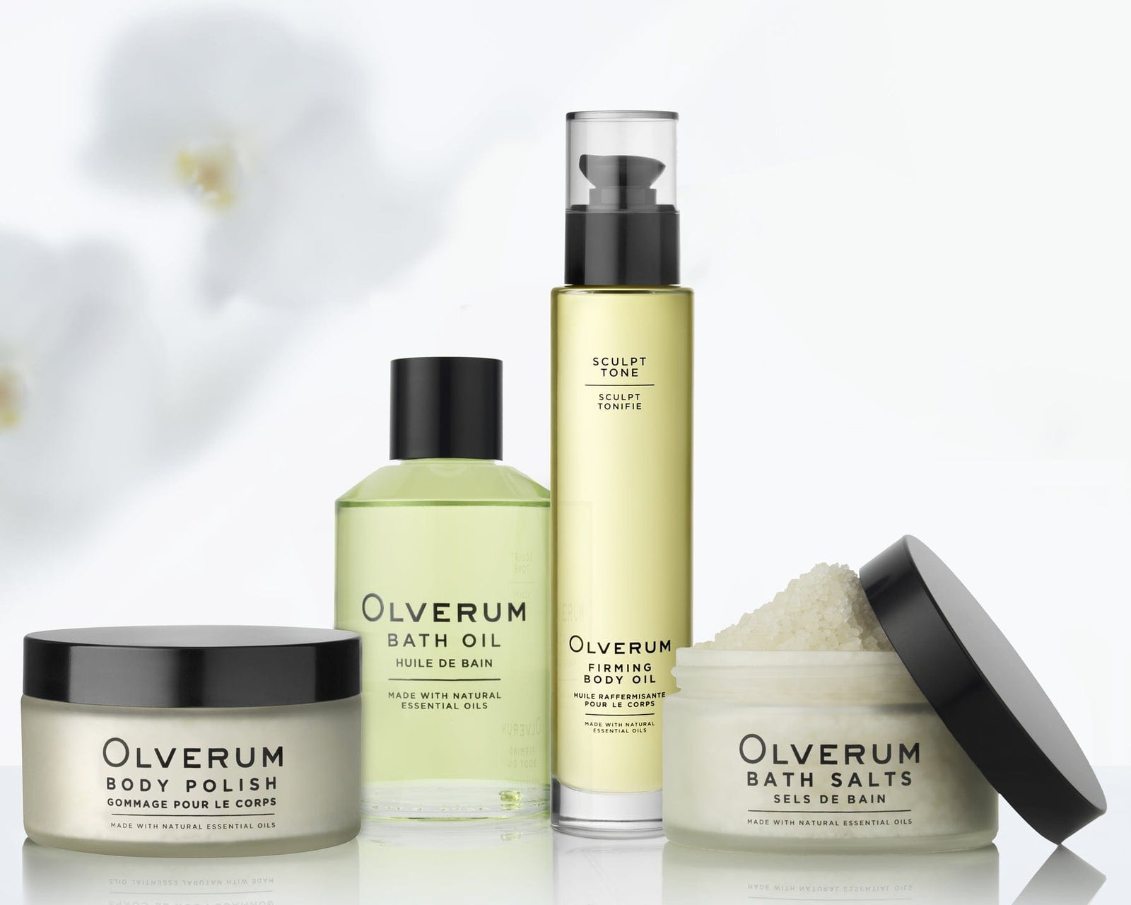 Restorative Ritual self-care kit by Olverum featuring bath oil, bath salts, body polish, and firming body oil for luxury skincare and relaxation.