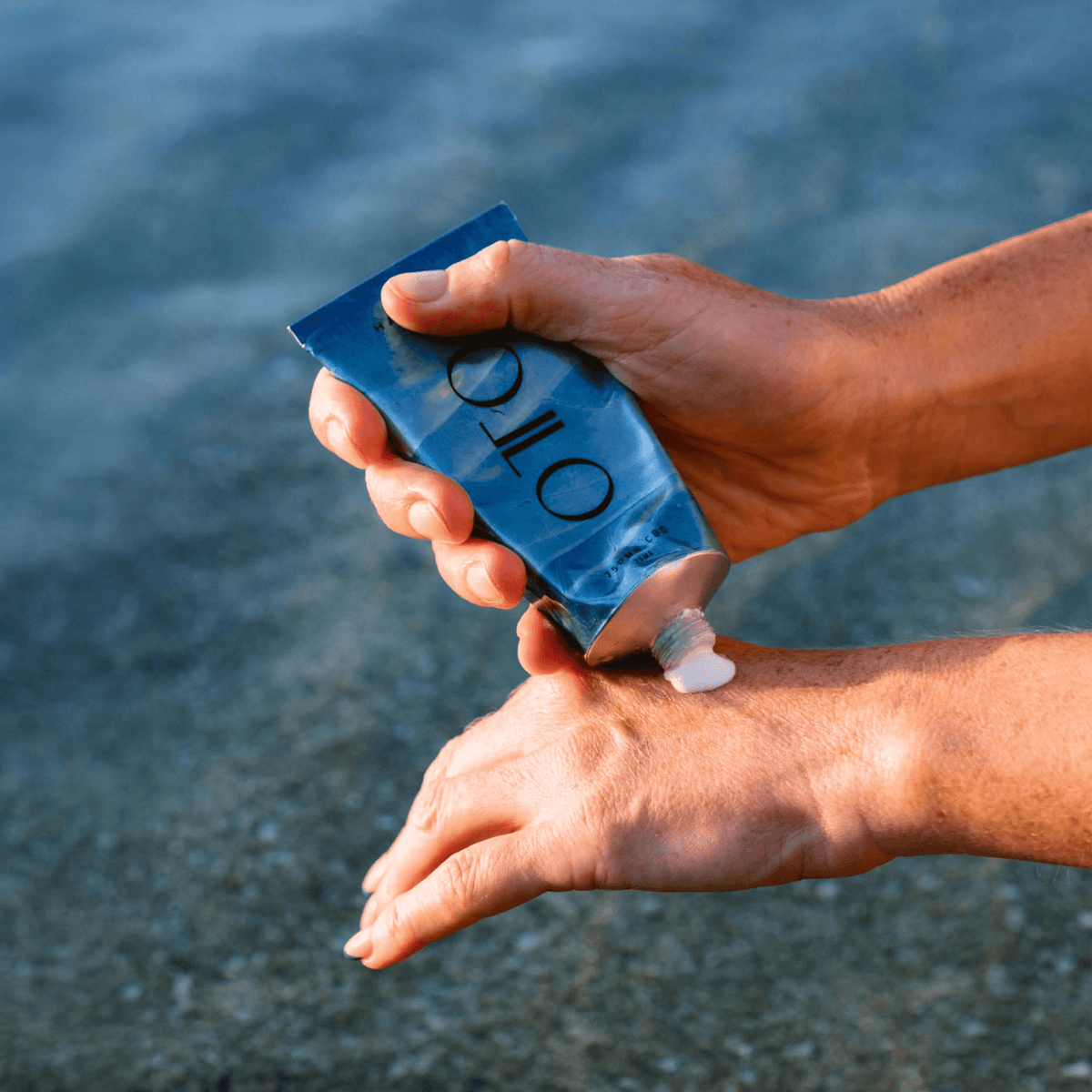 Nourishing CBD Hand Balm - CBD Hand Balm | Deep Moisture in a sleek blue 75ml tube by OTO, designed for hydrating and repairing dry hands with 150mg CBD.