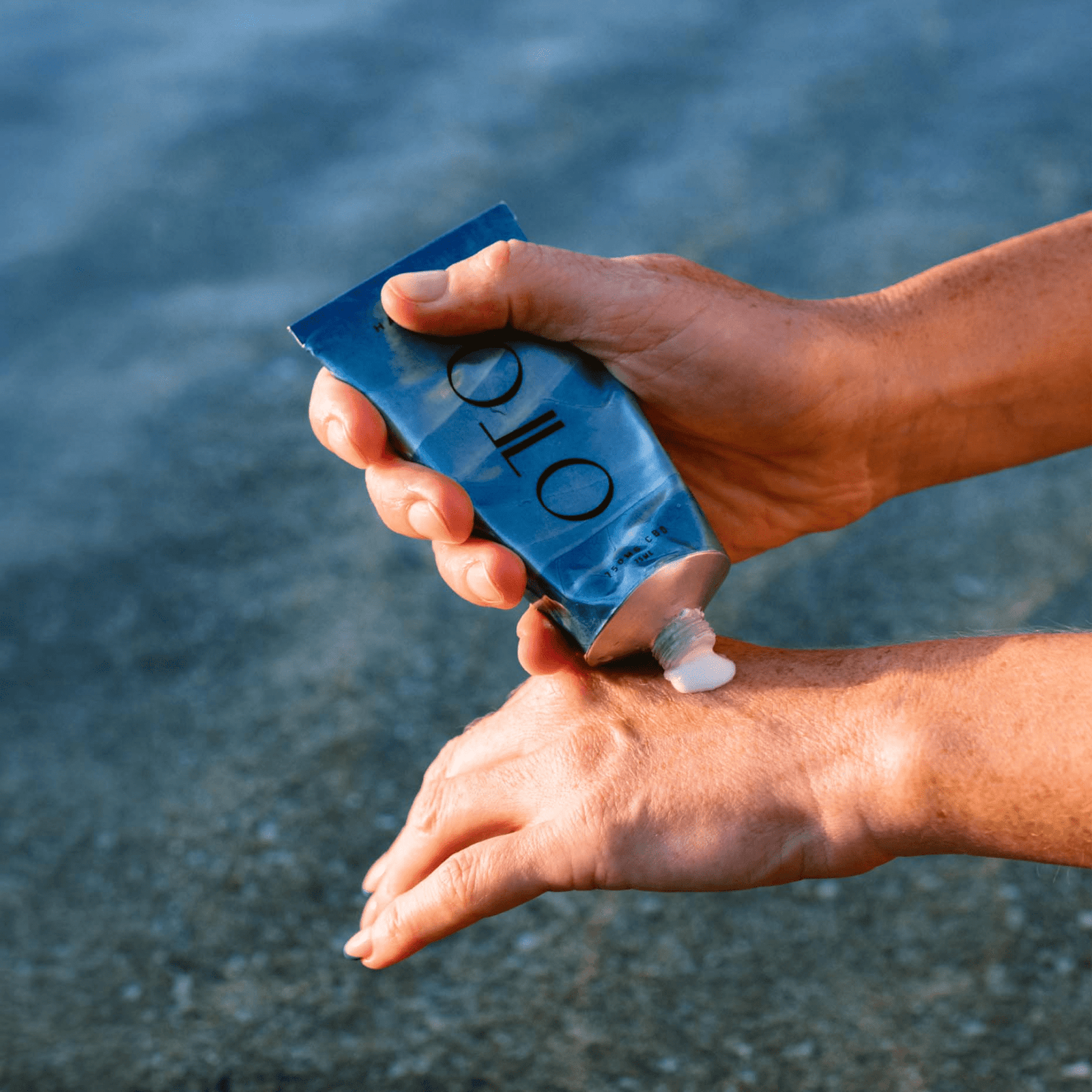 Nourishing CBD Hand Balm - CBD Hand Balm | Deep Moisture in a sleek blue 75ml tube by OTO, designed for hydrating and repairing dry hands with 150mg CBD.