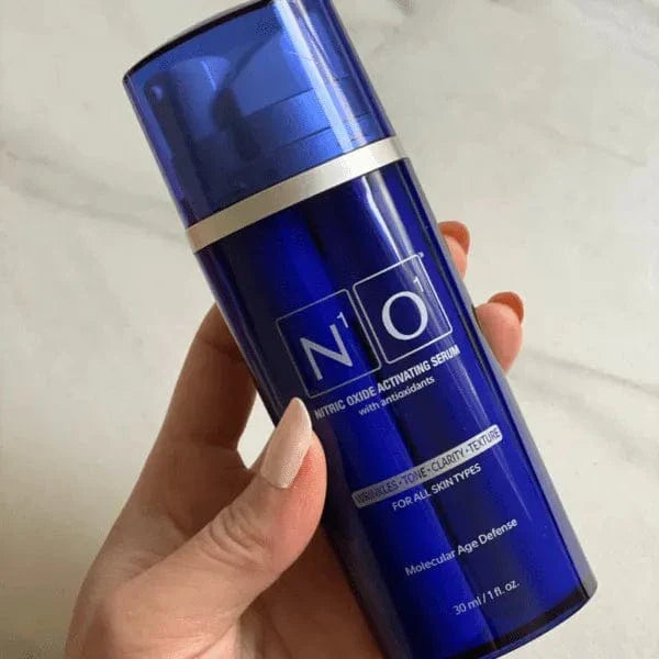 Age-Defiance Serum - Rejuvenate Skin | Reduce Wrinkles with Nitric Oxide and Vitamin C in a 30ml blue bottle for all skin types.