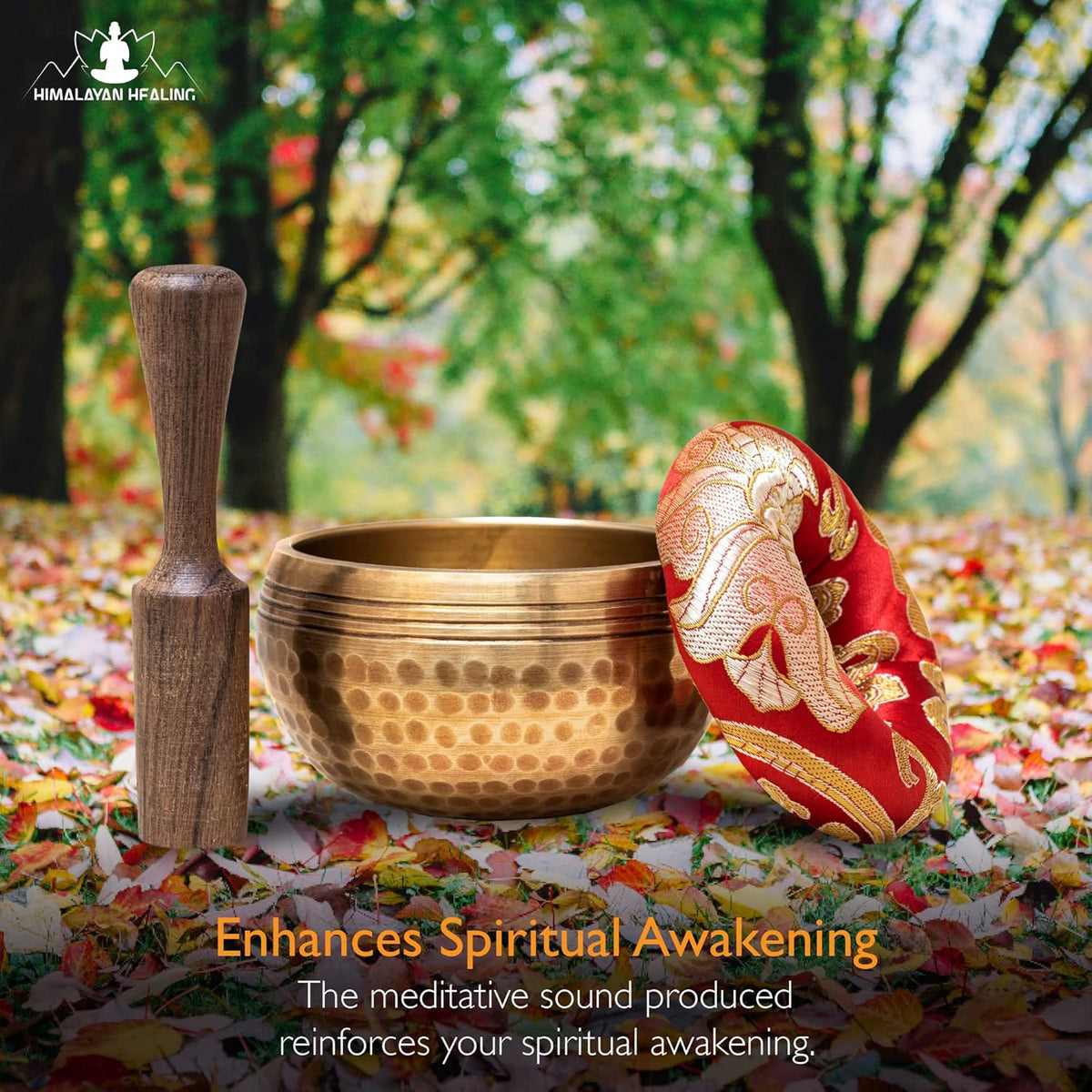 Handmade antique singing bowl with wooden mallet on red cushion, set in a forest stream for meditation and spiritual clarity.