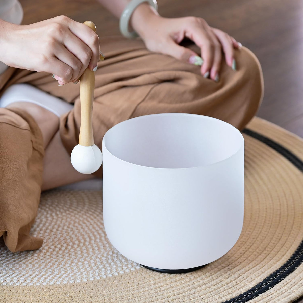 Crystal Singing Bowl Set used in meditation session for energy balance and sound therapy. Ideal for chakra alignment and mindfulness practice.