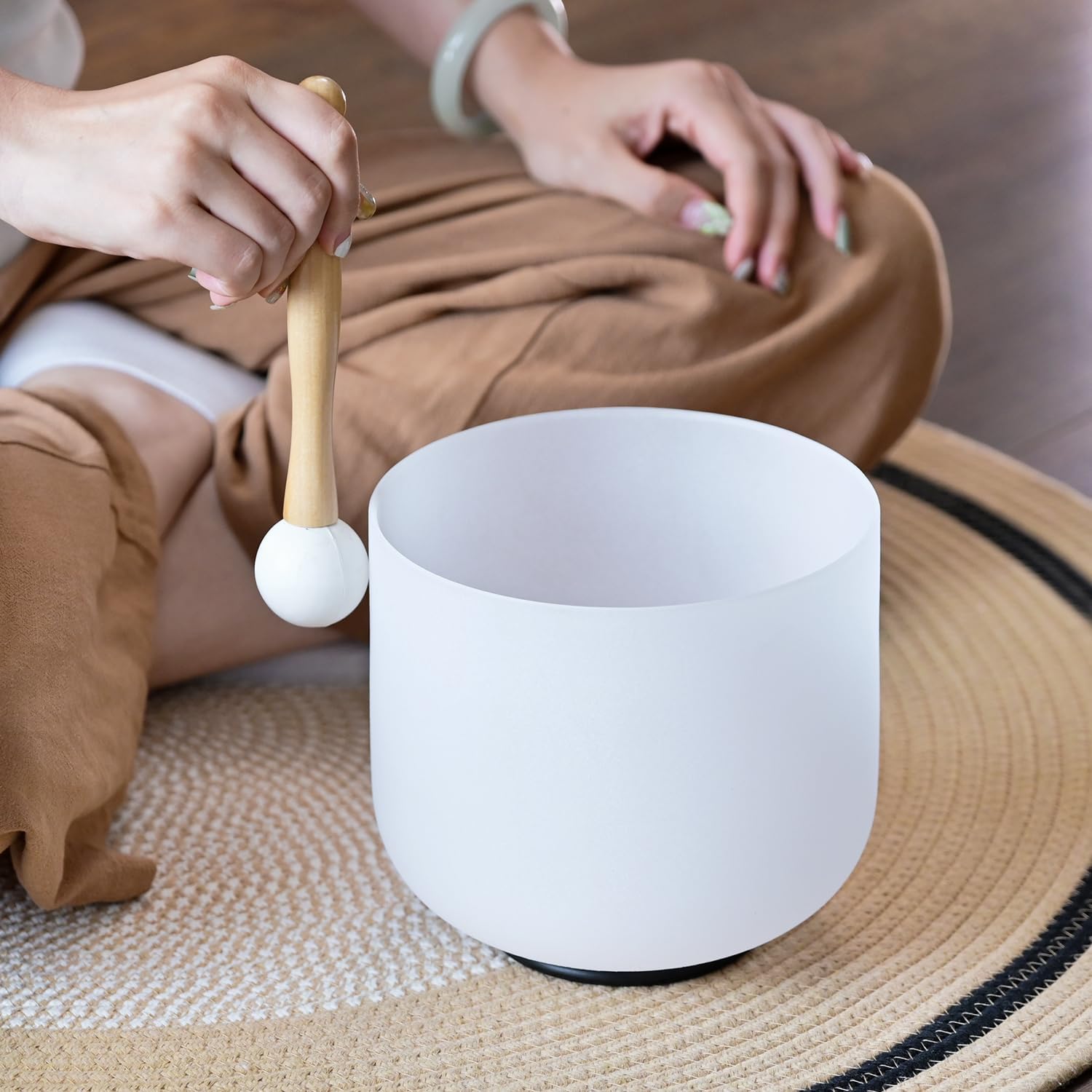 Crystal Singing Bowl Set used in meditation session for energy balance and sound therapy. Ideal for chakra alignment and mindfulness practice.