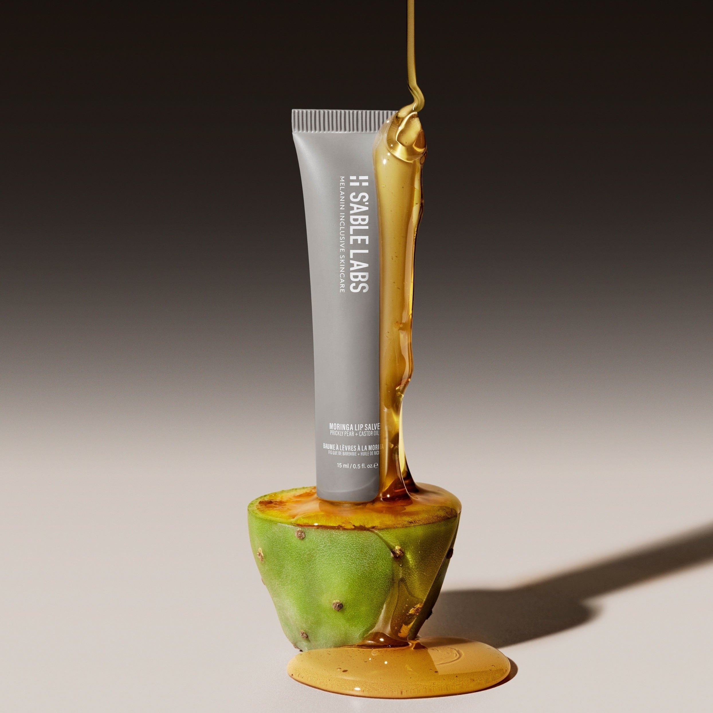 Moringa Lip Salve - Antioxidant Lip Salve by S’Able Labs in sleek grey tube. Hydrating lip balm with marula and castor oils for dry lips treatment.