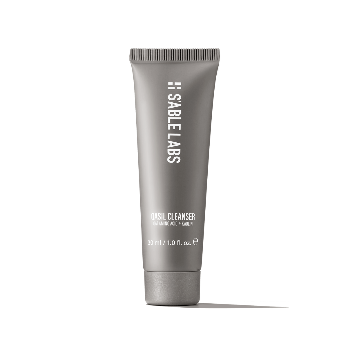 Qasil Cleanser by S’Able Labs in a sleek grey 150ml tube. Sulfate-free brightening facial cleanser for nourishing and clarifying skin care routine.