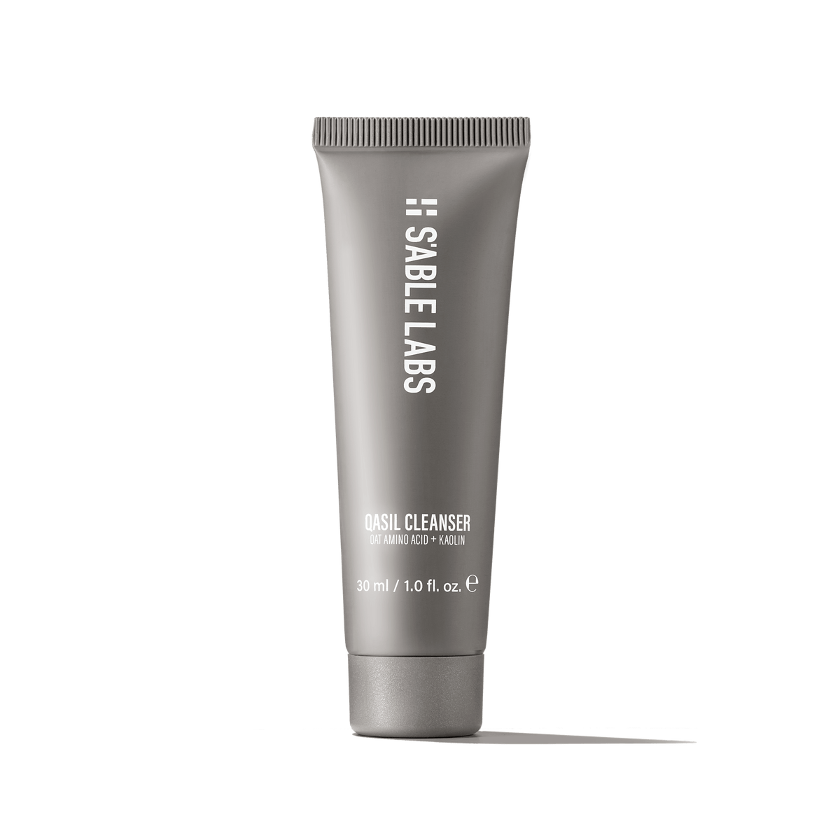 Qasil Cleanser by S’Able Labs in a sleek grey 150ml tube. Sulfate-free brightening facial cleanser for nourishing and clarifying skin care routine.