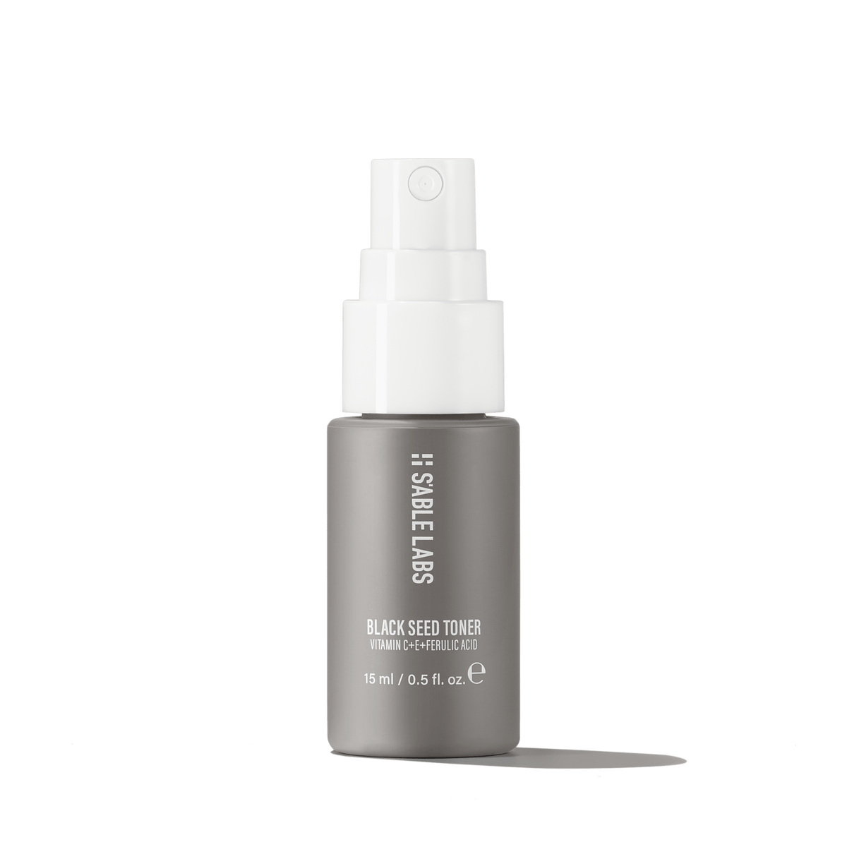 Black Seed Toner Mini - Antioxidant Formula with AHAs, Vitamin C & E in a sleek 15ml grey bottle by S’Able Labs, ideal for brightening and balancing skin.