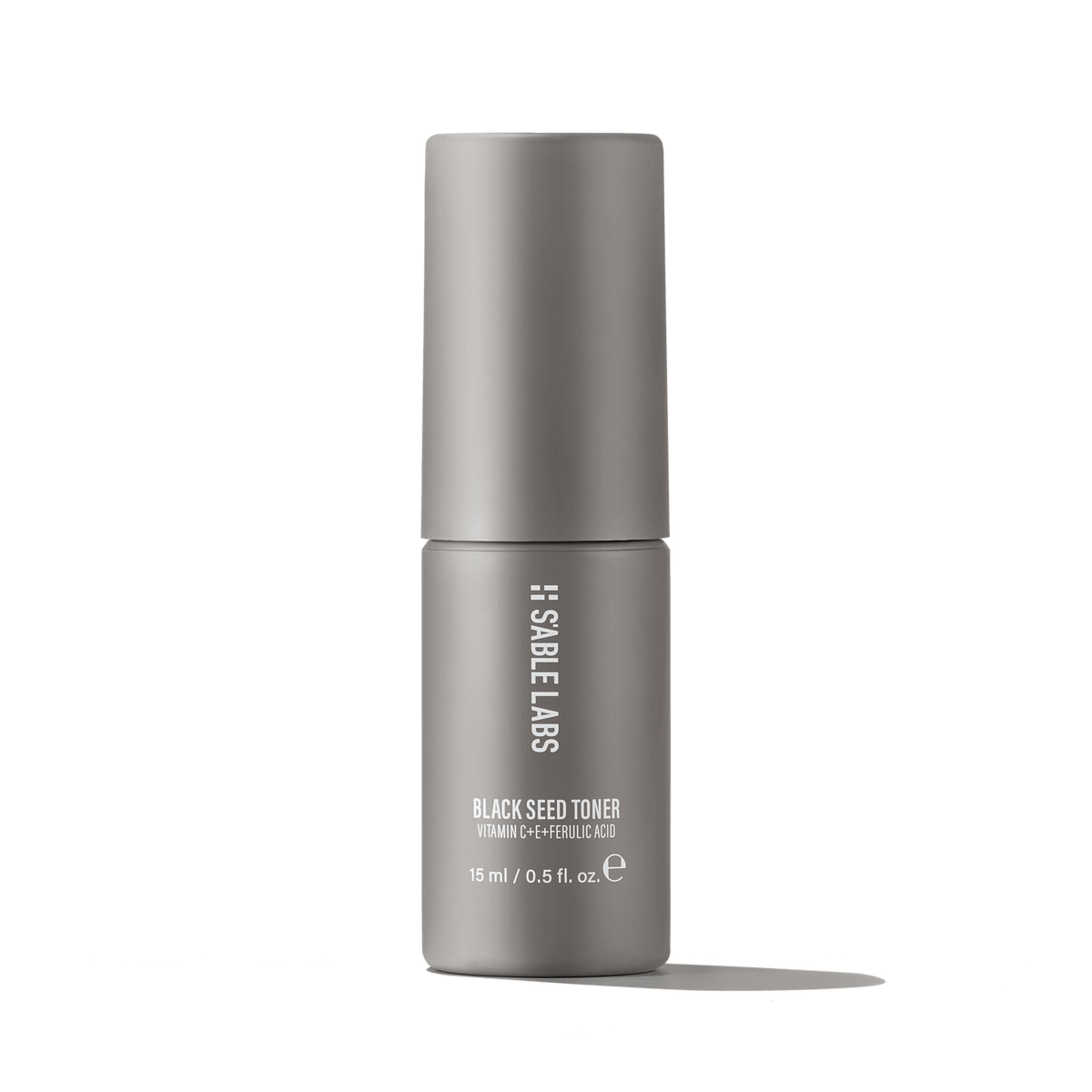Black Seed Toner Mini - Antioxidant Formula with AHAs, Vitamin C &amp; E in a sleek 15ml grey bottle by S’Able Labs, ideal for brightening and balancing skin.