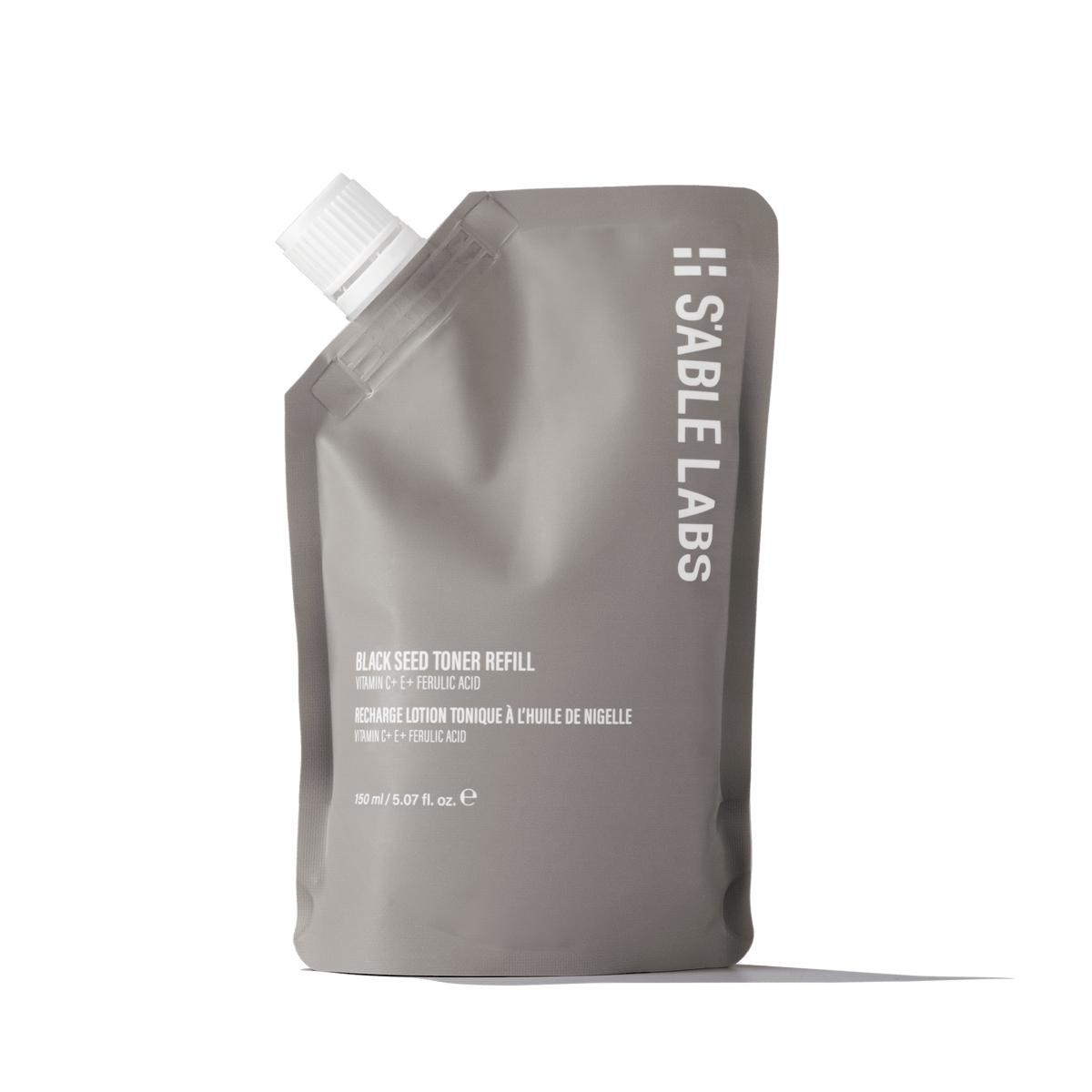 Black Seed Toner Refill - Radiance Restored in eco-friendly pouch by S’Able Labs. Features Vitamin C, E, black seed, and chamomile for glowing skin.