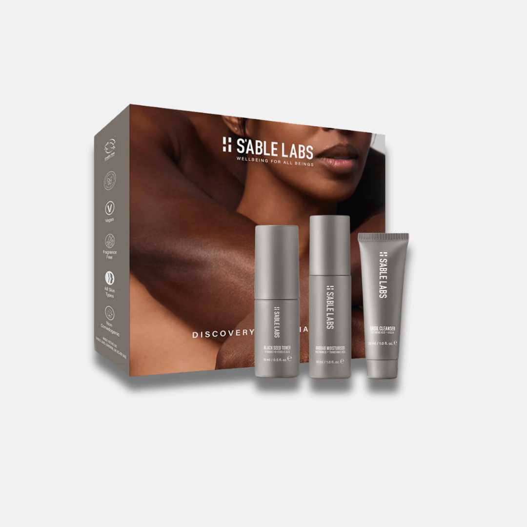 Melanin Skincare Kit - Glow &amp; Nourish | Mini Sizes featuring Qasil Cleanser, Black Seed Toner, and Baobab Moisturizer in sleek grey packaging. Ideal for testing natural skincare for melanin-rich skin.