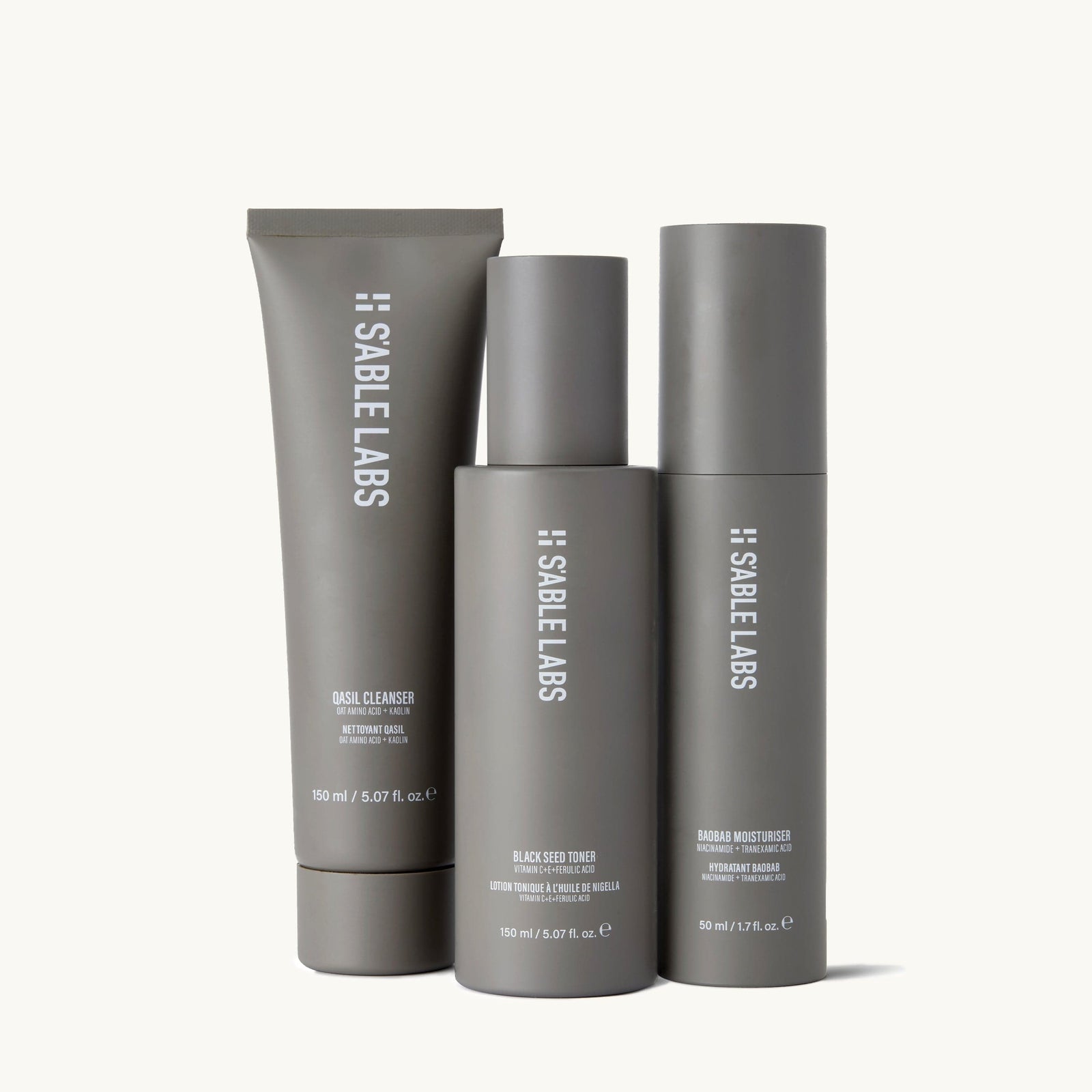 S'ABLE Labs Core Collection Giftset featuring Qasil Cleanser, Black Seed Toner, and Baobab Moisturiser in sleek grey packaging with a botanical-themed box.
