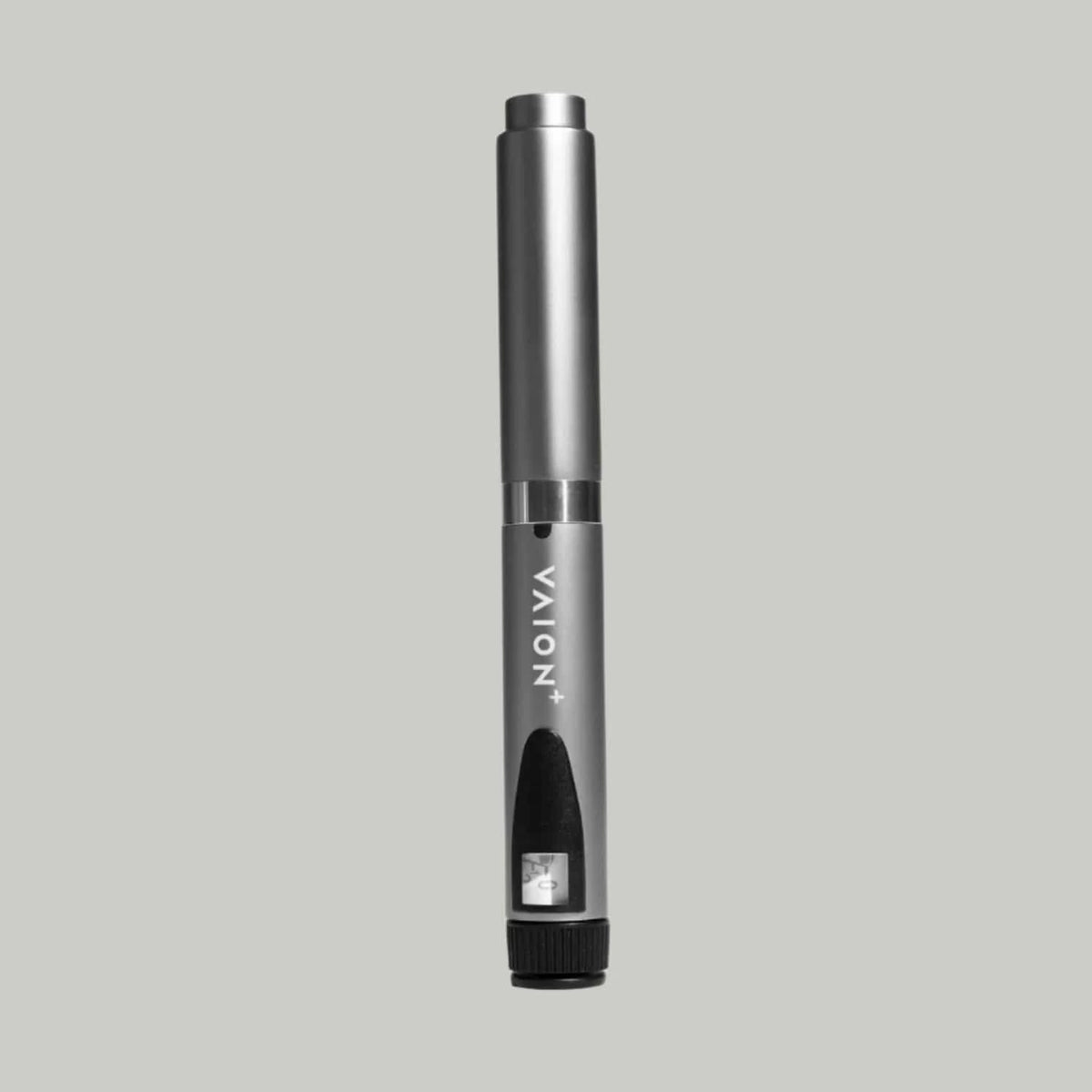 VAION+ NAD Pen - Cellular Wellness Solution | Boosts Energy. Sleek silver wellness pen held by hand, ideal for enhancing energy and focus.